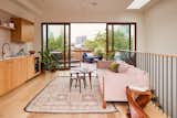 Penthouse level contains a new kitchenette and opens on the front and back terrace.
