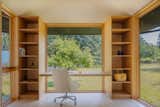 <span style="font-family: Theinhardt, -apple-system, BlinkMacSystemFont, &quot;Segoe UI&quot;, Roboto, Oxygen-Sans, Ubuntu, Cantarell, &quot;Helvetica Neue&quot;, sans-serif;">The art studio space contains a writing desk and plenty of storage via built-in maple shelving, also by Island Custom Woodworks. T</span><span style="font-family: Theinhardt, -apple-system, BlinkMacSystemFont, &quot;Segoe UI&quot;, Roboto, Oxygen-Sans, Ubuntu, Cantarell, &quot;Helvetica Neue&quot;, sans-serif;">he studio has turned out to be the perfect guest space—a little motel-style room,