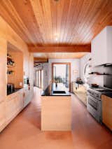 Inside the main house, the kitchen has been completely renovated and new cork floors run through the interior. The material was chosen for its durability and to echo the medieval past of the house. "The inner palette is very warm," Your Taalman. "There is plenty of wood."