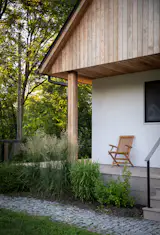 Monica and Peter sourced the cobblestones for the outdoor walkways from Europe, along with the windows and many of the interior materials and furnishings. "We imported a lot of our materials from Poland, which is where our family is from,