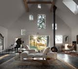 Brooklyn-based architecture firm Estudio Esmero worked within the foundation and steel structure of an existing carriage house in upstate New York for this new build, which features concrete floors with bright gold kintsugi details.