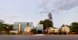 Architect Davey McEathron sketched out a plan that divided the corner property into a main house and an ADU, separated by a garage with a home office above.
