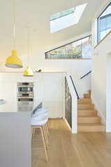 Kitchen, clerestories, skylight, stairs