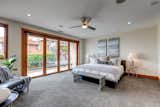 The master bedroom includes a private balcony overlooking the walkstreet with a great ocean view