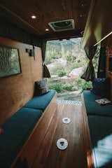 Back doors open and fold away for unparalleled views into the outdoors. Both sets of bench seats have access to large storage areas.