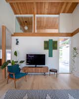 High transom windows allow light to enter in varying ways throughout the day and change with the seasons