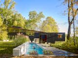 This 300-SF cabana and lap pool comprised phase 2 of the original vacation home constructed in 2008 on a small inland lake in southwest Michigan.