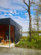 Exterior The cantilever also positions the structure closer to the lake while avoiding more questionable soils
immediately surrounding the lake.  Photo 4 of 5 in Michigan Residential Cabana and Pool by Nate W.