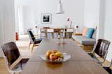 Dining Room, Chair, Lamps, Ceiling Lighting, Medium Hardwood Floor, Table Lighting, and Table eco design apartment by fine interior I living room  Photo 1 of 10 in eco design apartment by fine interior / Kirsten Wiegand