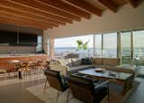 Tiling in the kitchen extends to the deck, so when the 32-foot lift and slide doors open there’s no transition between indoors and out.