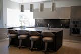 Custom installed Italian kitchen by Armony Kitchens barchairs by Eric Kuster 