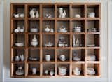 Custom cabinetry to display owners porcelain collection