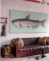 Hallway and Medium Hardwood Floor Catfish in the mudroom...Red Hook is a neighborhood by the water, so throughout the house we have flourishes, as it were, that pay tribute to the home’s location.  Photo 1 of 10 in My House: Cookbook Author Jessie Sheehan’s Convivial Brooklyn Townhouse