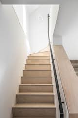 Baltic Birch staircase and custom metal handrail