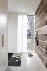 Terra Cotta Tiled Screen Wall separating Main Entrance and Living room