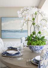 From the upholstery to the artwork the classic blue presentation is continued throughout the dining area.