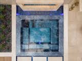 At the center of this oasis is a 1,000 square foot pool with multiple levels including walk-in steps and a cooling sun shelf. 
