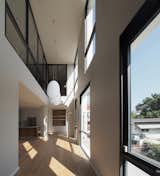 Living Room, Ceiling Lighting, and Light Hardwood Floor  Photo 6 of 16 in Inthamara House by Phuttipan Aswakool