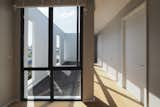 Hallway and Light Hardwood Floor  Photo 14 of 16 in Inthamara House by Phuttipan Aswakool