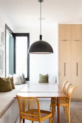 Dining Room, Chair, Bench, Table, Recessed Lighting, Medium Hardwood Floor, and Pendant Lighting  Photo 10 of 14 in Rodeo Drive by Alloy Homes Incorporated