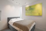 Bedroom, Bed, Porcelain Tile Floor, Accent Lighting, and Ceiling Lighting Guest Bedroom   Photo 6 of 12 in Loloma 5, Unit 1 – Will Bruder, FAIA by Brittainy Williamson