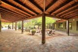 Deep overhangs surround the home on every side to provide shade and shelter