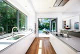 Kitchen with bi-folding doors to covered outside eating space