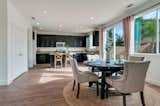 Dining Room, Medium Hardwood Floor, Chair, Recessed Lighting, Bar, Ceiling Lighting, Stools, and Table  Photo 6 of 20 in The Kooden House by Alicia Fukuzawa