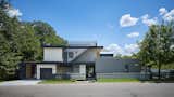 Exterior, Stucco, Hipped, Metal, Flat, Metal, House, Concrete, Glass, and Wood 007 House by Dick Clark + Associates  Exterior Metal Concrete Stucco Flat Photos from 007 House