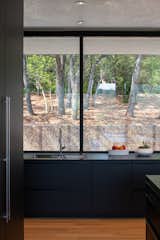 Kitchen view to retaining wall 