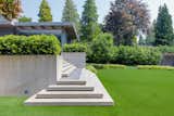 A grand staircase spills on to the children's play lawn.