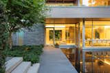 The residence floats atop a tranquil water body.