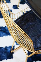 Detail of the dinette chair by Jayson Home and the rug by Anthropologie