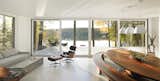 Living Room, Chair, Sofa, Pendant Lighting, and Concrete Floor  Photo 6 of 11 in Cantilever House by Birdseye