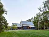 Exterior, Gable RoofLine, Metal Roof Material, House Building Type, Wood Siding Material, and Flat RoofLine ©Peter Murdock  Photo 7 of 19 in Battenkill by Birdseye