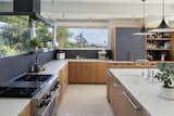 Custom kitchen with Wolf range and Heath Ceramics tile