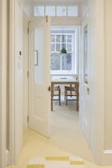 Hallway and Vinyl Floor Hallway to Dining - opening doors view  Photo 6 of 15 in Cyril Mansions Flat by Irene Astrain