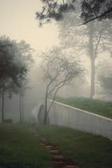 A green bed sheet is placed into the calmed landscape.