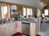 The Arcadia kitchen, with cabinets built by the homeowner, who also assembled the pre-cut, numbered kit.