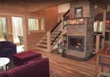 Living Room, Fireplace, Stairs. All open onto the Sunspace in the AQ-1 by Enertia®