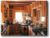 Kitchen with window to the sunspace 