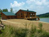 Exterior, Metal Roof Material, House Building Type, Shed RoofLine, and Prefab Building Type Lakeside Lodge and Garage  Photo 1 of 12 in Lakeside Lodge (Custom) by Enertia Building Systems Inc.