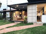 Exterior, Tile Roof Material, Flat RoofLine, Metal Siding Material, Shipping Container Building Type, Metal Roof Material, and Hipped RoofLine  Photo 2 of 14 in Tiny Home Shipping Container by Pablo Cisneros R.