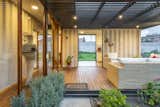 Outdoor, Front Yard, Metal Patio, Porch, Deck, Flowers, Small Patio, Porch, Deck, and Metal Fences, Wall  Photo 7 of 14 in Tiny Home Shipping Container by Pablo Cisneros R.