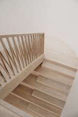 Bespoke staircase design and bentwood handrail.