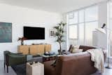 Living Room with Leather Sectional, Mid Century Accessories, designed by Hive LA Home