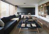 Living Room, Sofa, Standard Layout Fireplace, Medium Hardwood Floor, Chair, Ceiling Lighting, Bench, Coffee Tables, Bookcase, and Floor Lighting  Photo 4 of 20 in house in los búhos by  Architect Jorge Muradas