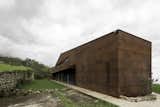 Exterior, House Building Type, Metal Siding Material, Metal Roof Material, and Gable RoofLine Rear facade  Photo 10 of 17 in Casa Galpón by Nico Provoste C