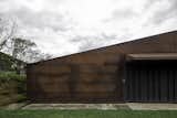 Exterior, House Building Type, Metal Roof Material, Gable RoofLine, and Metal Siding Material Rear facade  Photo 12 of 17 in Casa Galpón by Nico Provoste C