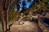 Winding pathways lead to a zen treehouse.